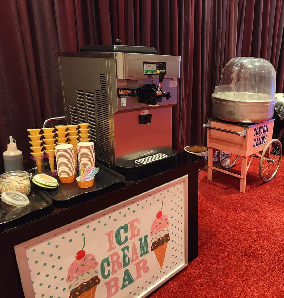 Ice cream and candy floss cart at an event