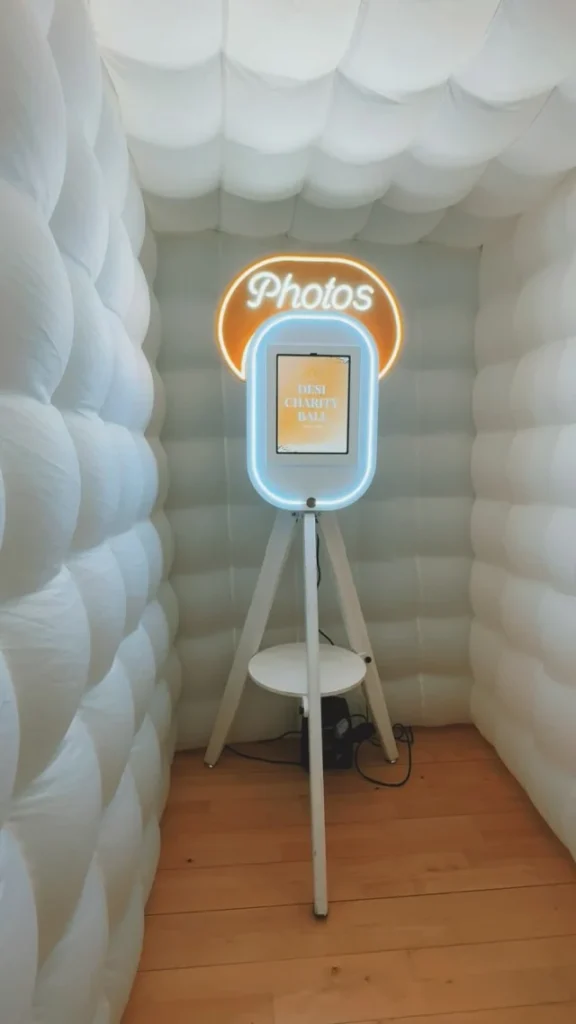 Selfie pod inside a white inflatable booth