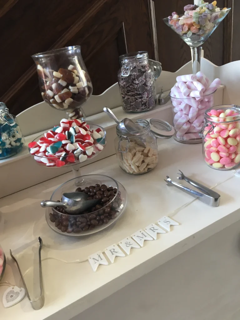 Sweet cart with jars of sweets