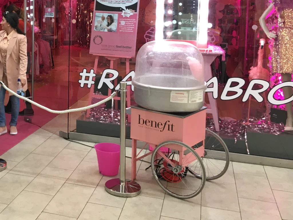 Candy floss cart at a branded Benefit cosmetics event