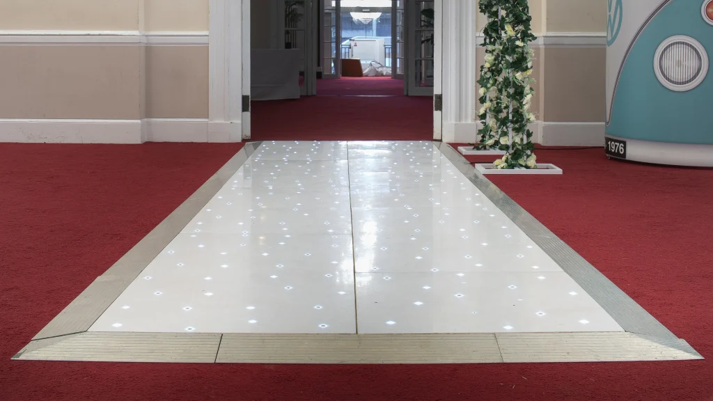 White LED dance floor laid in a function room