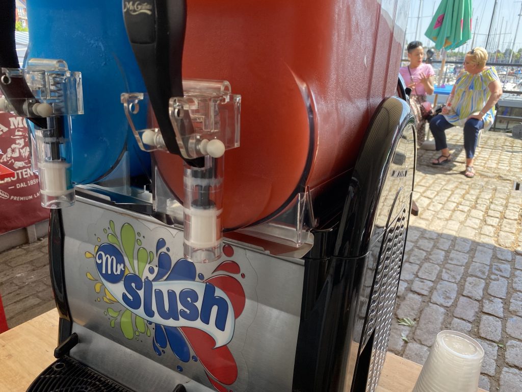 Slush machine serving drinks at an outdoor event