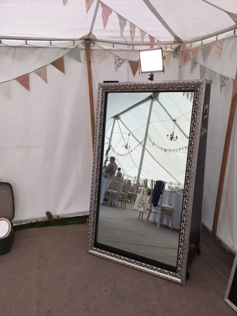 Magic mirror photo booth inside a marquee