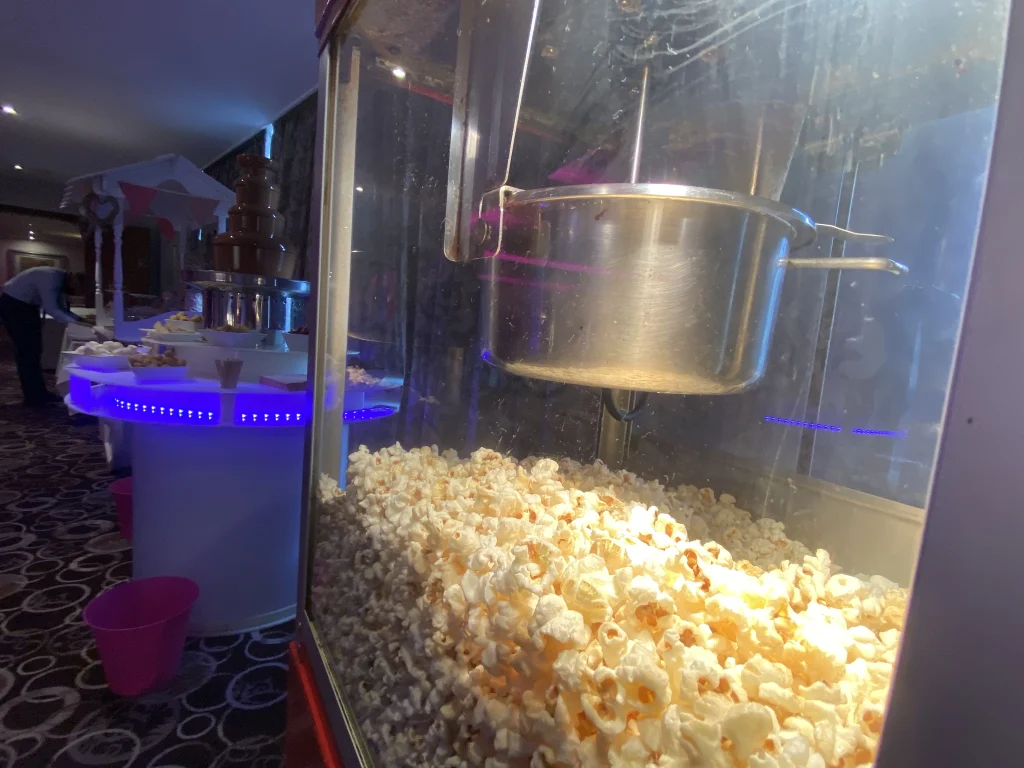Popcorn machine filled with fresh popcorn
