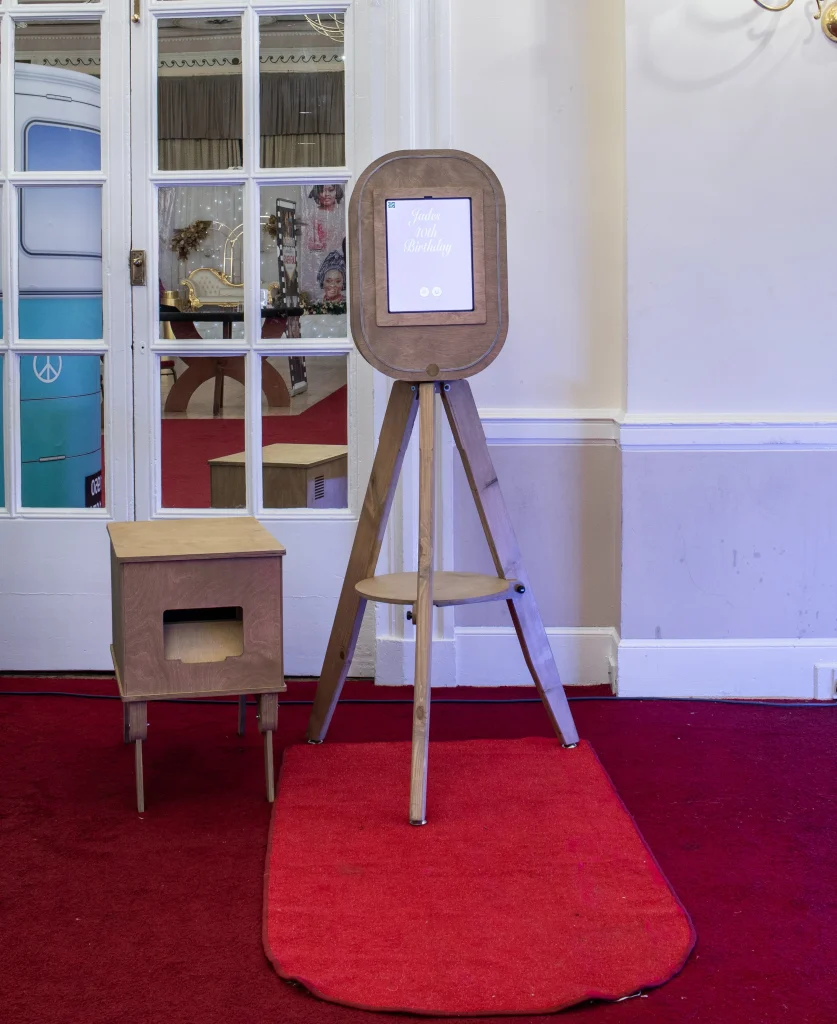 Selfie pod photo booth on a red carpet