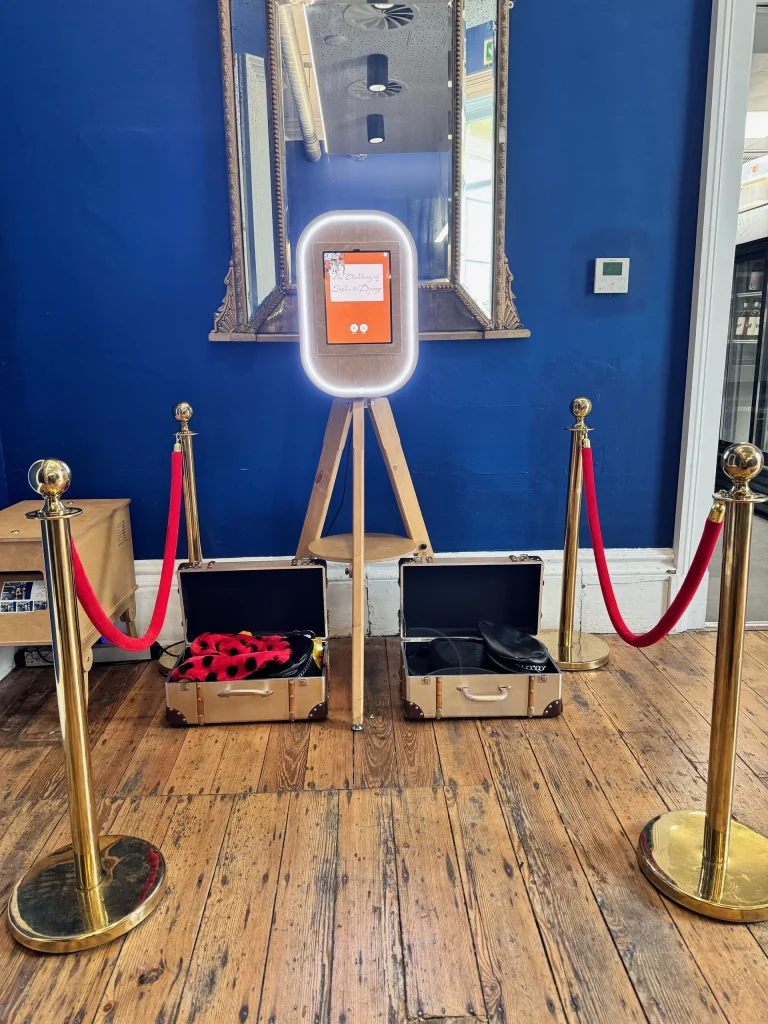 Selfie pod photo booth with rope barriers