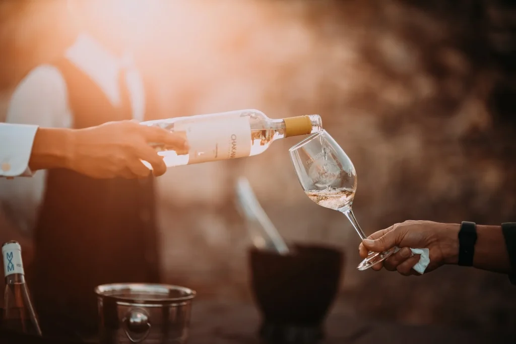 Wine being poured into a glass