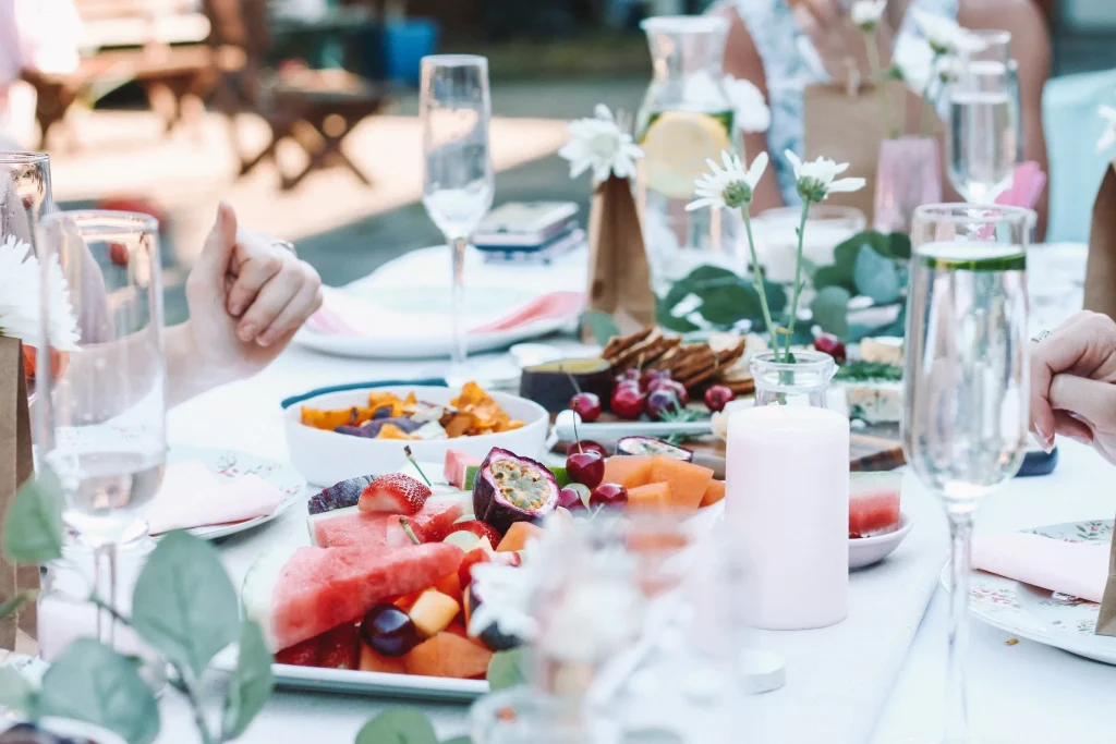 Party table with fresh fruit and glasses